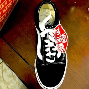 Vans.  New in box. Size 4 mens / 5.5 womens.